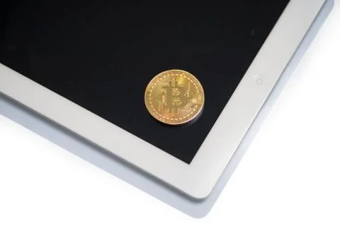 Ipad with bitcoin cryptocurrency coin Stock Photos