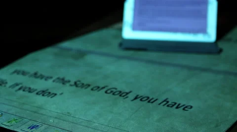 Ipad on desk from above with Bible passage projected 2 Stock Footage 47487190
