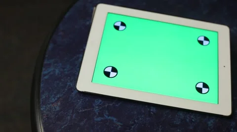IPad on desk with green screen Stock Footage 53246486