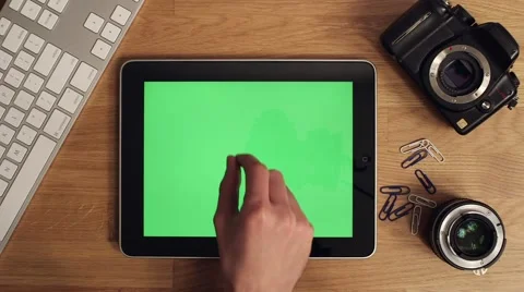 Ipad greeen screen app users hand Stock Footage 63391352