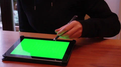 IPad greenscreen display actions with stylus pen Stock Footage 31743734
