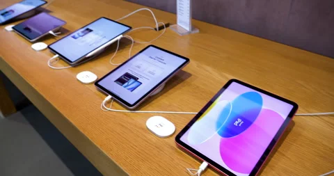 IPad Lineup Pan in Apple Store Display Stock Footage 312177987