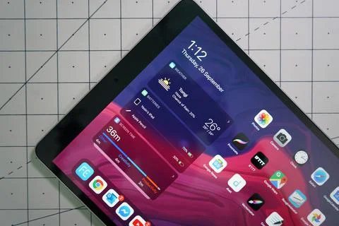 Ipad pro tablet on top a white desk with patterns Fotos Stock