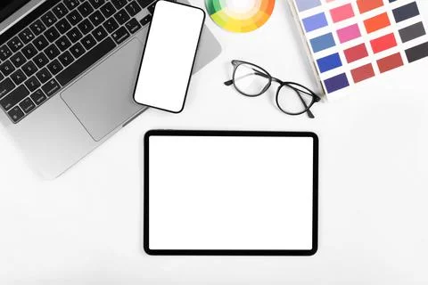 IPad pro with white screen on white color background. Flatlay. Stock Photos