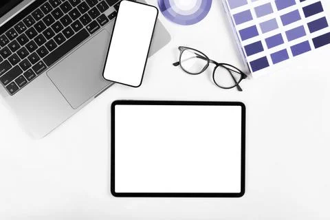 IPad pro with white screen on white color background. Flatlay. Stock Photos