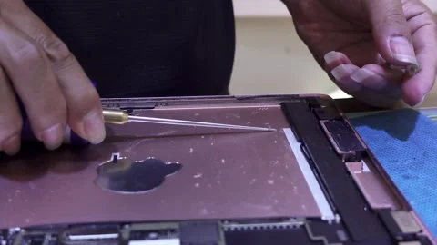 Ipad shell glue removal, 4K Video stock 315098748