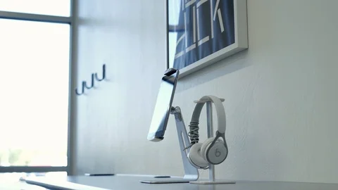 Ipad sitting on desk, passby, technology, hd Stock Footage 124279459