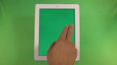 Ipad stands horizontal selling finger across the screen Stock Footage 41087146
