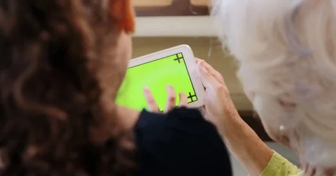 Ipad Tablet Computer Technology For Internet Used By Grandmother Grandchild Stock Footage 76722509