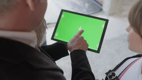 Ipad Tablet Green Screen Held By Businessman In Construction Site Video stock 98798842