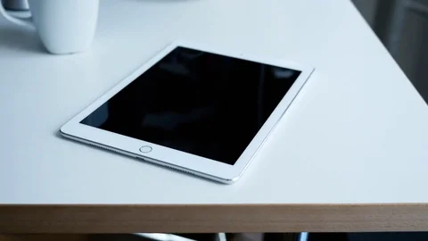 IPad on White Desk Stock Footage 80216020