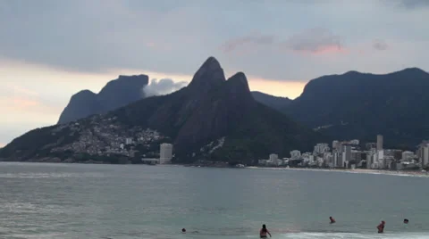Ipanema Beach in evening light with RIO Mountains Stock Footage 39430869