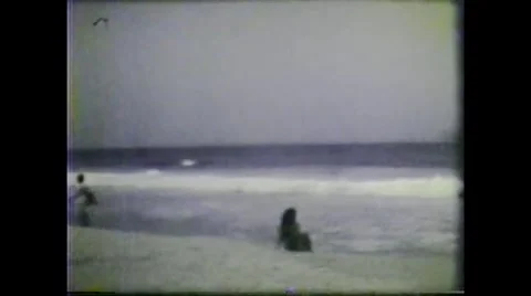 Ipanema Beach scene in Rio de Janeiro showcasing people in 1980 Stock Footage 291723349