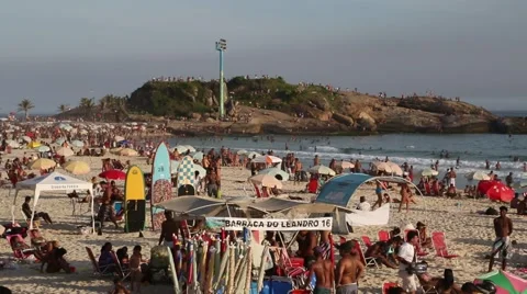 Ipanema Beach stalls with Arpoador Rock in the background 스톡 동영상 60373650