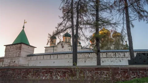 Ipatiev Monastery and the park it in Kostroma at sunset. Russia Stock Footage 294178627