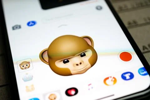 IPhone 11 Pro with faces expressing sentiments Stock Photos