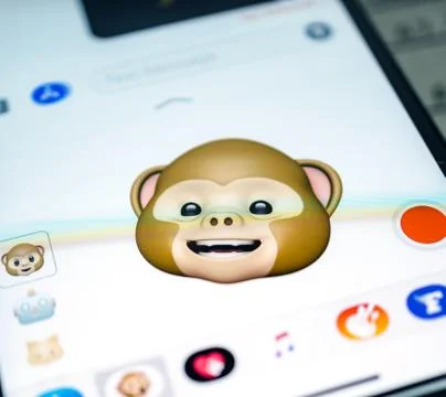 IPhone 11 Pro with faces expressing sentiments Stock Photos