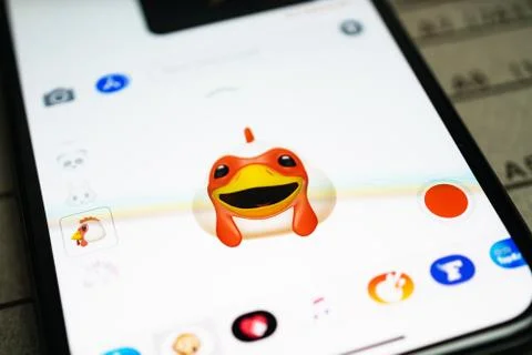 IPhone 11 Pro with faces expressing sentiments Stock Photos