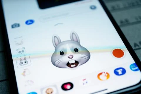 IPhone 11 Pro with faces expressing sentiments Stock Photos