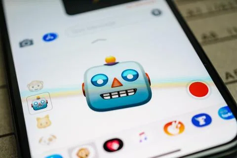 IPhone 11 Pro with faces expressing sentiments Stock Photos