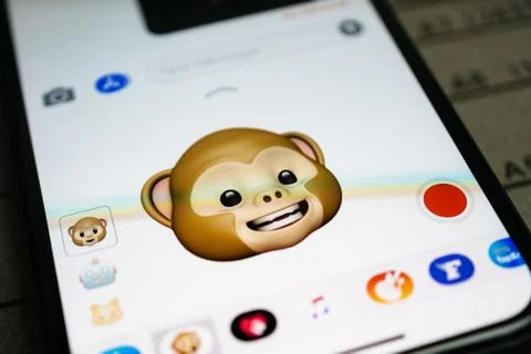IPhone 11 Pro with faces expressing sentiments Stock Photos