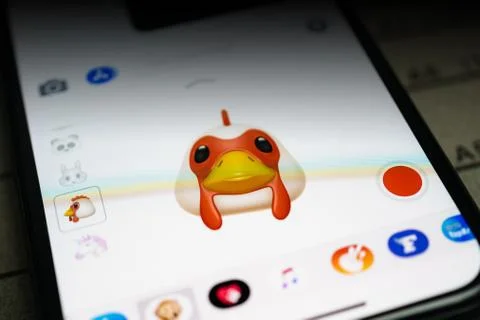 IPhone 11 Pro with faces expressing sentiments Stock Photos