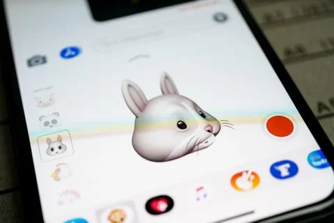 IPhone 11 Pro with faces expressing sentiments Stock Photos