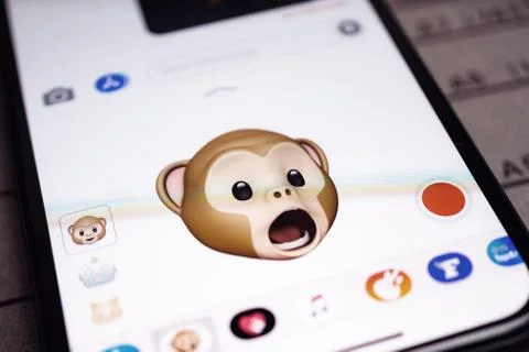 IPhone 11 Pro with faces expressing sentiments Stock Photos