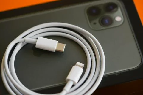 IPhone 11 Pro Max with Fast Charger Stock Photos