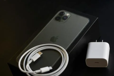 IPhone 11 Pro Max with Fast Charger Stock Photos