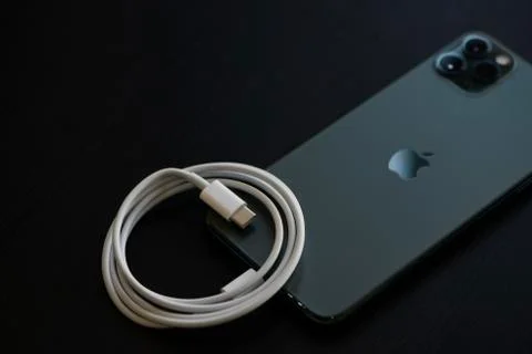 IPhone 11 Pro Max with Fast Charger Stock Photos