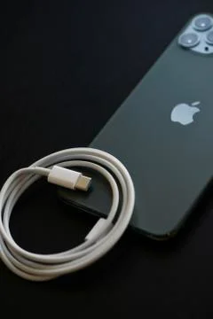 IPhone 11 Pro Max with Fast Charger Stock Photos