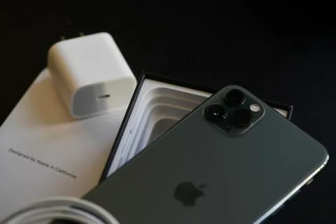 IPhone 11 Pro Max with Fast Charger Stock Photos