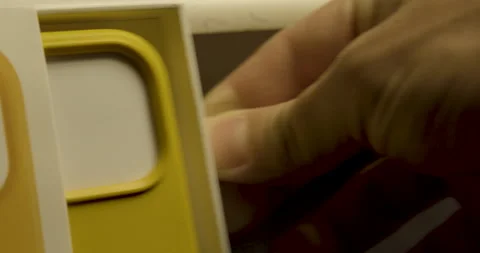 Iphone 12 Pro max, close up, Apple logo over California poppy leather case 스톡 동영상 144644898