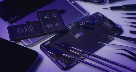 IPhone 13 Pro, Apple Smartphone with replacement battery and tools for repair Stock Footage 237399676