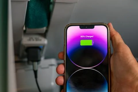 IPhone 13 Pro max charging during a train ride Stock Photos