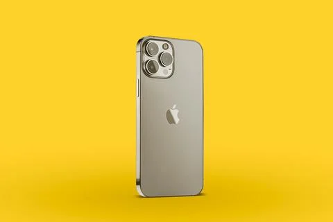 IPhone 13 pro max on a yellow background. three close-up phone cameras, apple Stock-Fotos