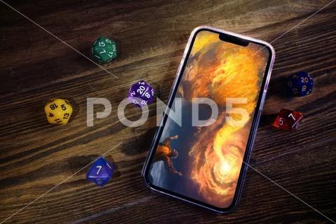 Iphone 14 mockup next to dices for dnd PSD Template