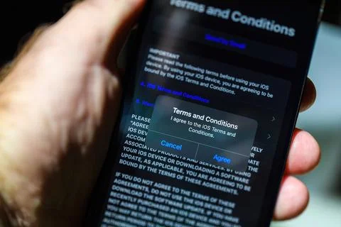 IPhone 15 Pro Max Setup: Agreeing to Terms and Conditions Stock Photos