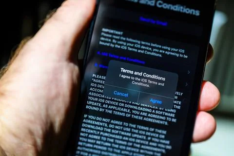 IPhone 15 Pro Max Setup: Agreeing to Terms Stock Photos