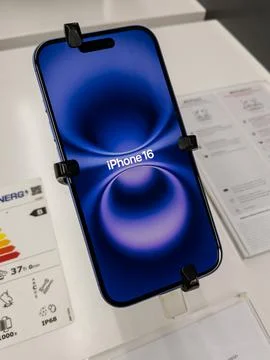 IPhone 16 Displayed in Store with Features Highlighted Stock Photos