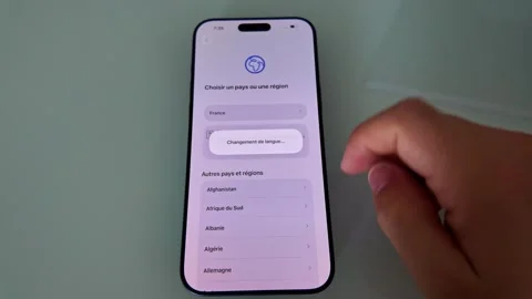 IPhone 17 Pro Max Setup Screen with Hand Interaction Stock Footage 321378861
