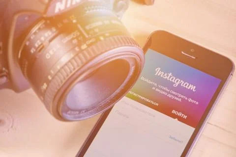 IPhone 5s with mobile application for Instagram Stock Photos