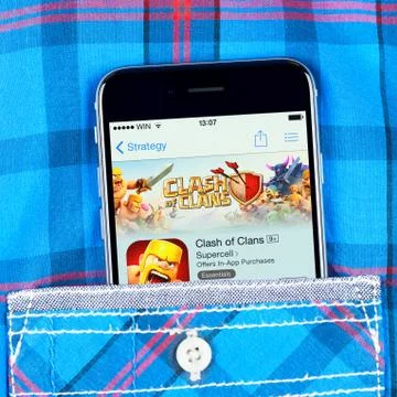 IPhone 6 displaying Clash of clans game app. Stock Photos