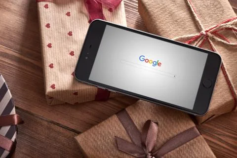 Iphone 6 plus among gift-boxes Fotos de archivo