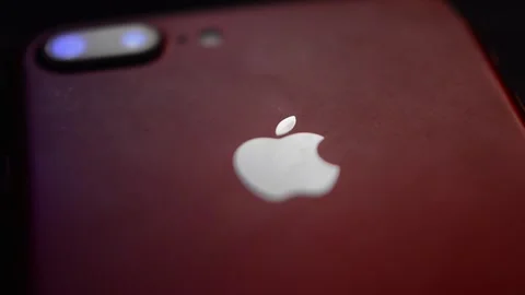 Iphone apple logo and camera in a night dark background. Video stock 234286730