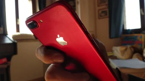 Iphone by apple in a modern blur background. man use iphone by apple. 库存影片 233686992