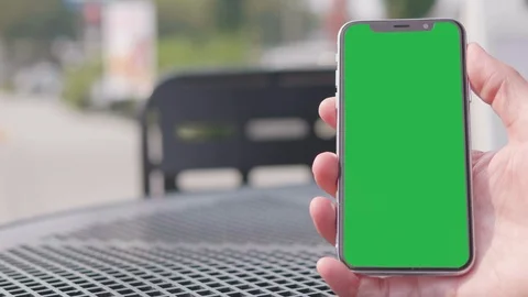 IPhone Chroma Green Screen, Apple Phone Held in Hand, Smartphone Device Close Up Stock Footage 94431718