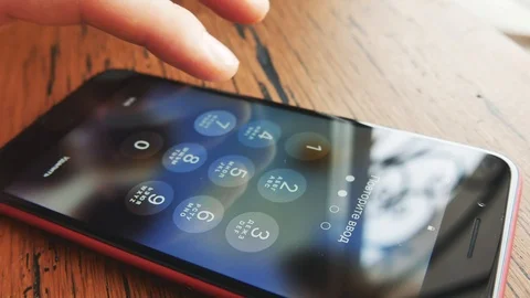 IPhone close up. Finger dials the phone number. Stock Footage 103613683