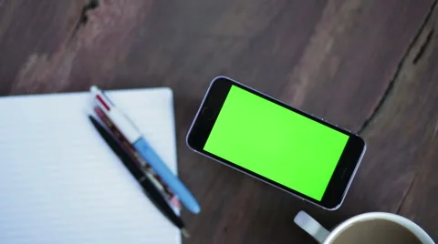 IPhone with Coffee and Notepad with Green Screen Landscape Mode Stock Footage 58892410